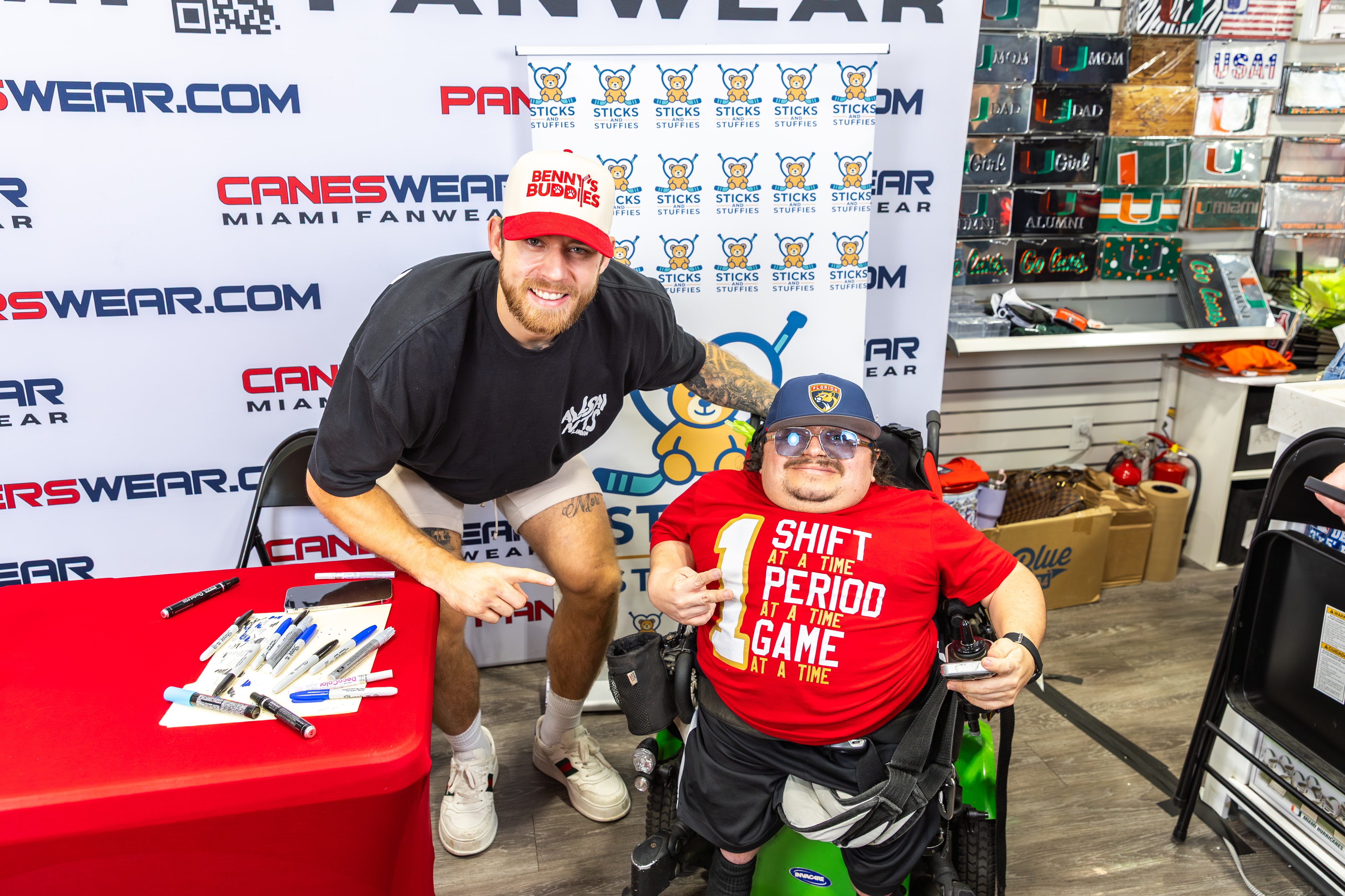 A.J. Greer with fans at the Sticks and Stuffies signing table at CanesWear