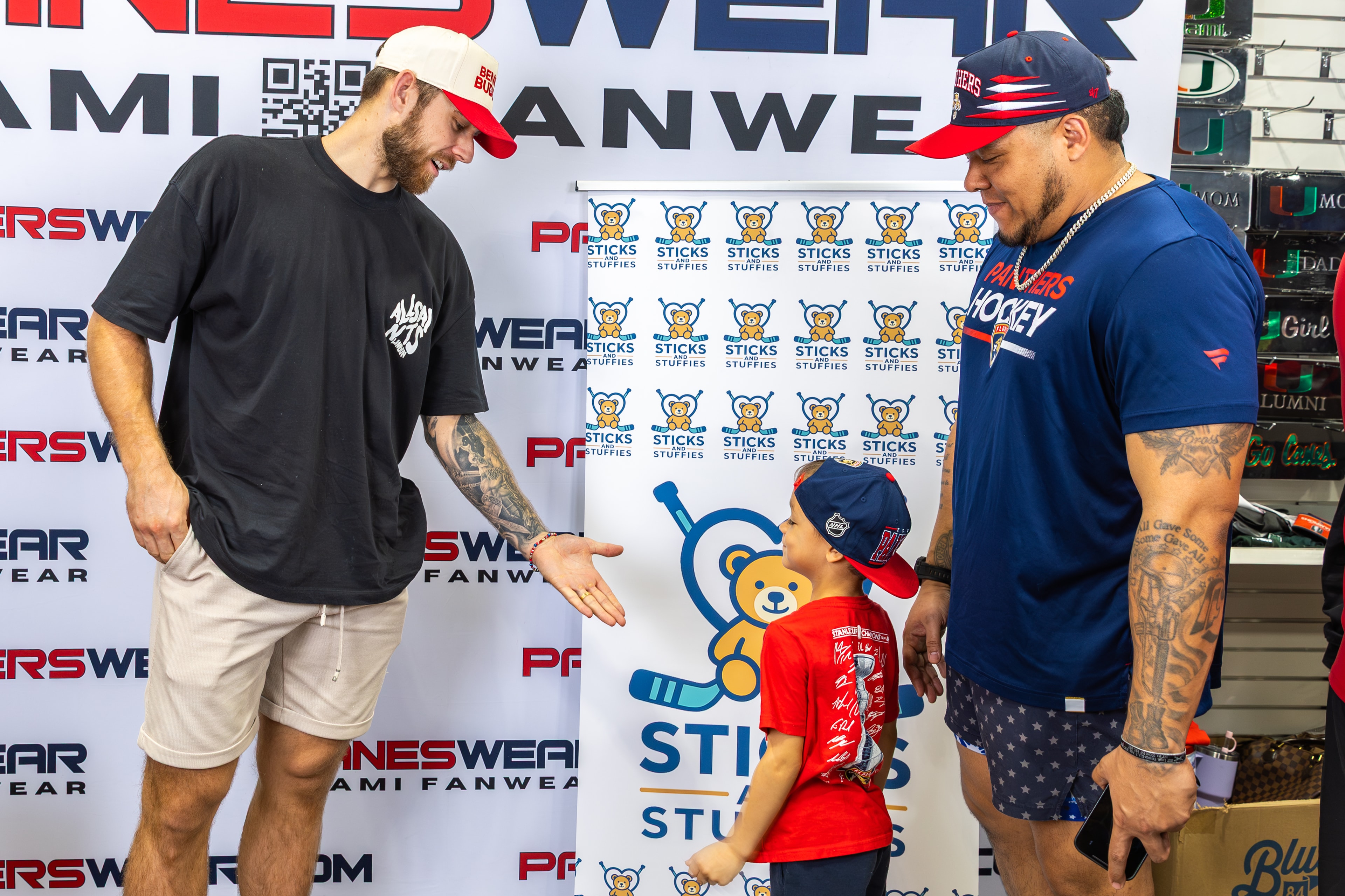 A.J. Greer signing autographs at the Sticks and Stuffies event at CanesWear