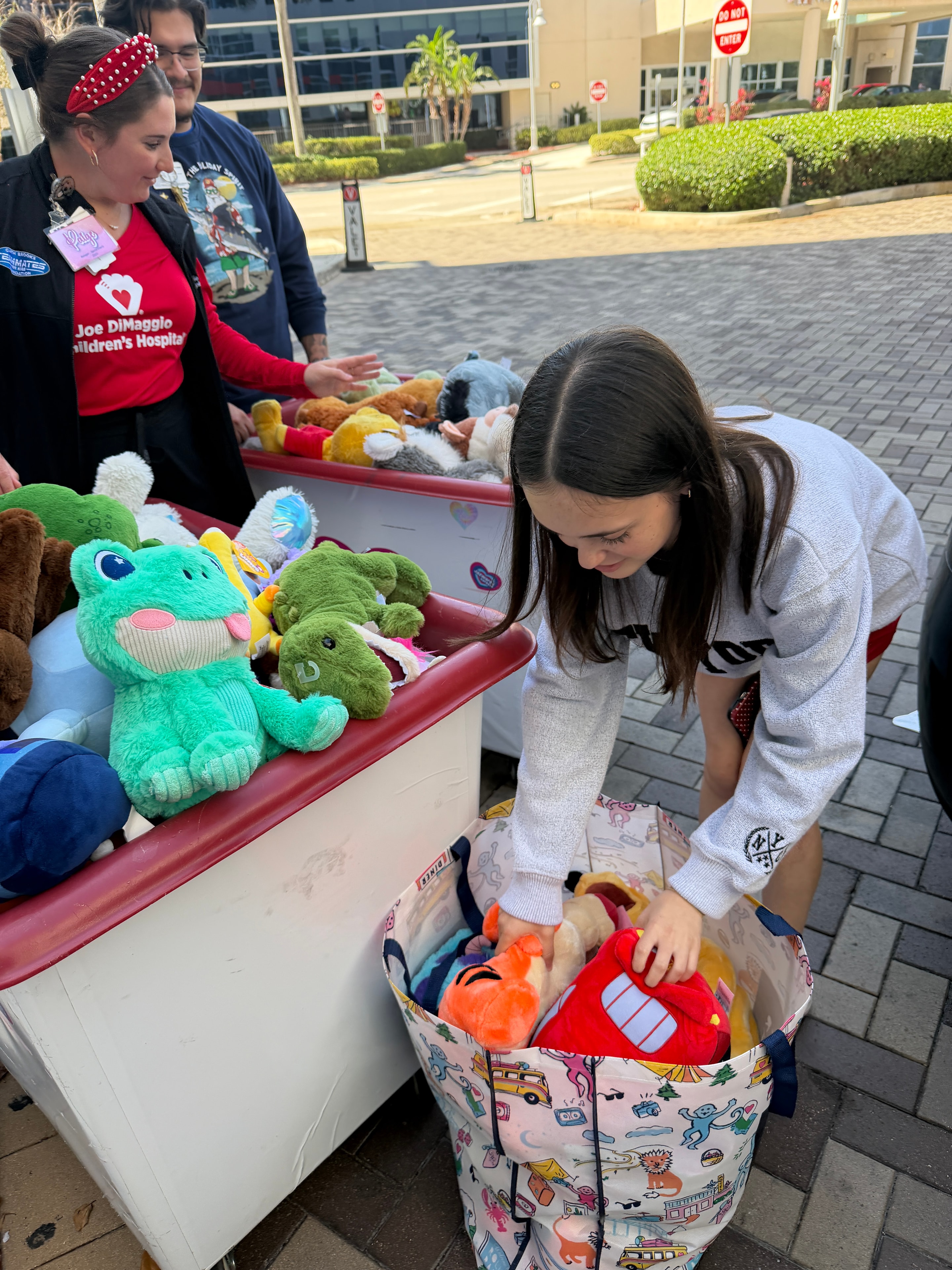 Claire Goodman at Joe DiMaggio Children's Hospital with the stuffed animal donation